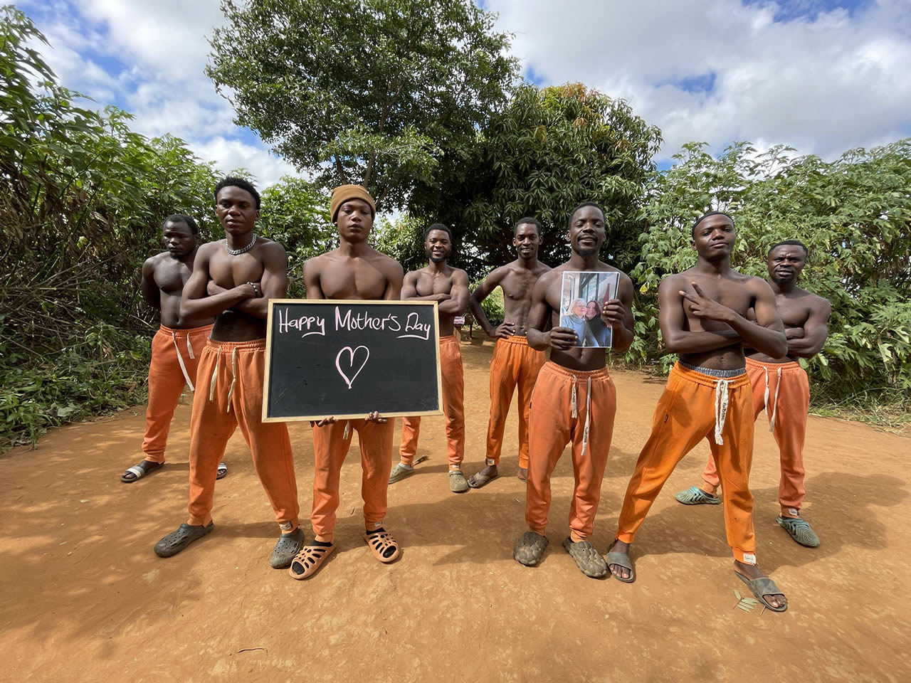 African Orange Pants Team